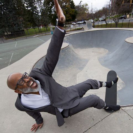Get Shit Done Later Men's Socks- worn by model skateboarding