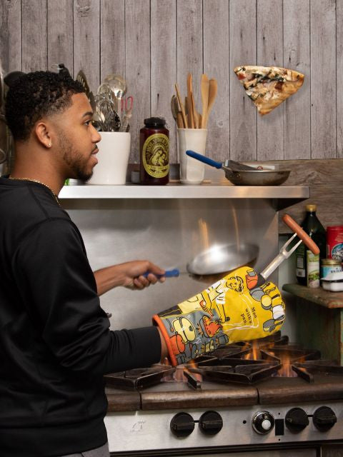 Man With A Pan Oven Mitt- being used