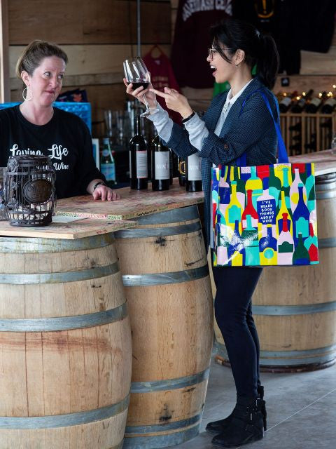I've Heard Good Things About Wine Shopper Bag- being used