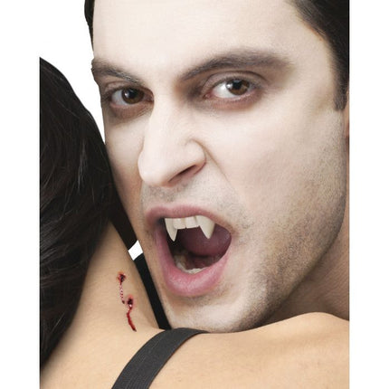 Vampire Fangs- worn by model