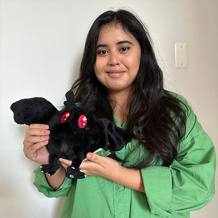 Snugglemi Snacker Baby Mothman- held by model
