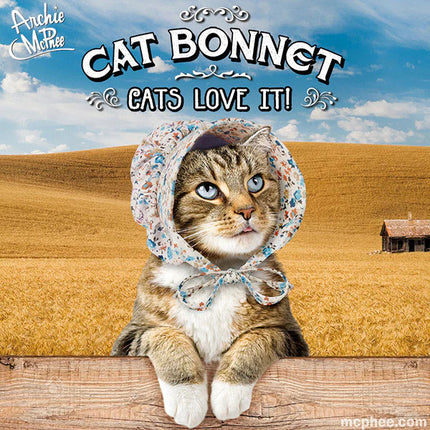 Tabby Cat wearing bonnet