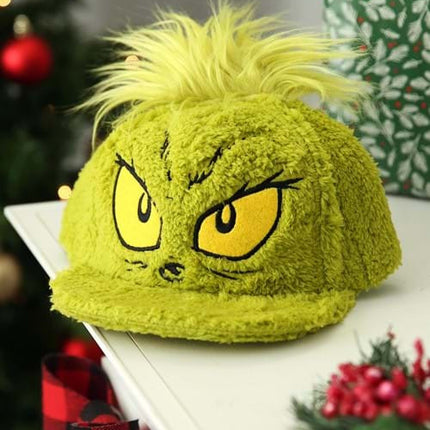 Dr. Seuss- The Grinch Fuzzy Cap- displayed on table