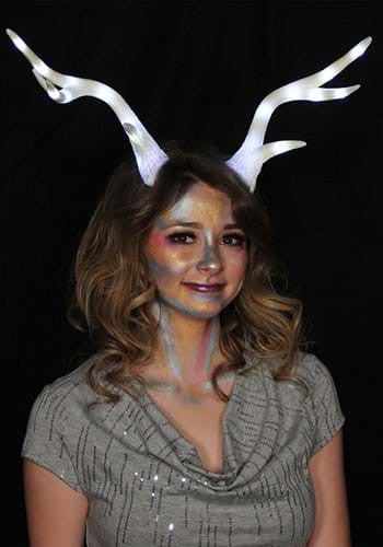 Light-Up Deer Antler White LumenHorns- glowing antlers worn by female model