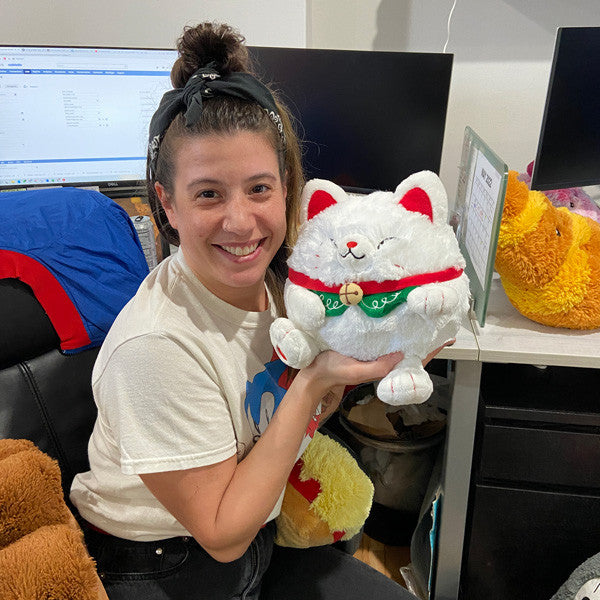 Mini Squishable Lucky Cat- held by model