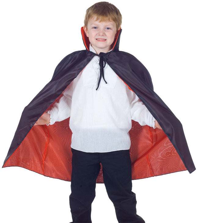 Your child will look great in this reversible cape. This black and red cape is reversible and has a tie on the neck.  One size fits most children.