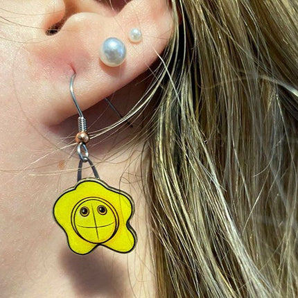 STI Earrings- Herpes Earring on Model