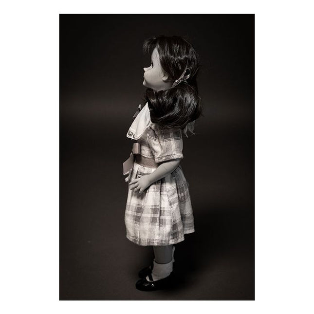 Left-side view of Talky Tina Doll