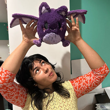 Mini Squishable Spooky Bat- held by model