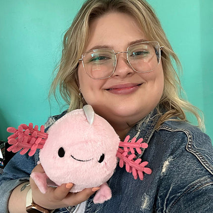 Snugglemi Snacker Baby Axolotl- held by model