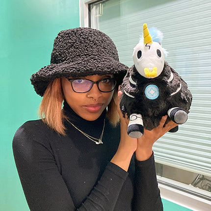Mini Squishable Undead Unicorn- held by model